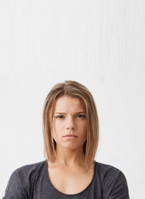 Woman looking tired and frustrated